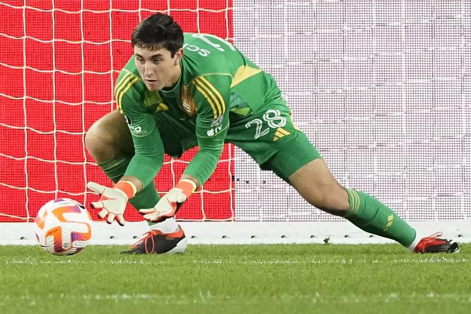 Apr 2, 2024; Columbus, OH, USA; Columbus Crew goalkeeper Patrick Schulte (28) makes a save during the second half of the Concacaf Champions Cup quarterfinal against Tigres UANL at Lower.com Field. The game ended in a 1-1 tie. Mandatory Credit: Adam Cairns-USA TODAY Sports