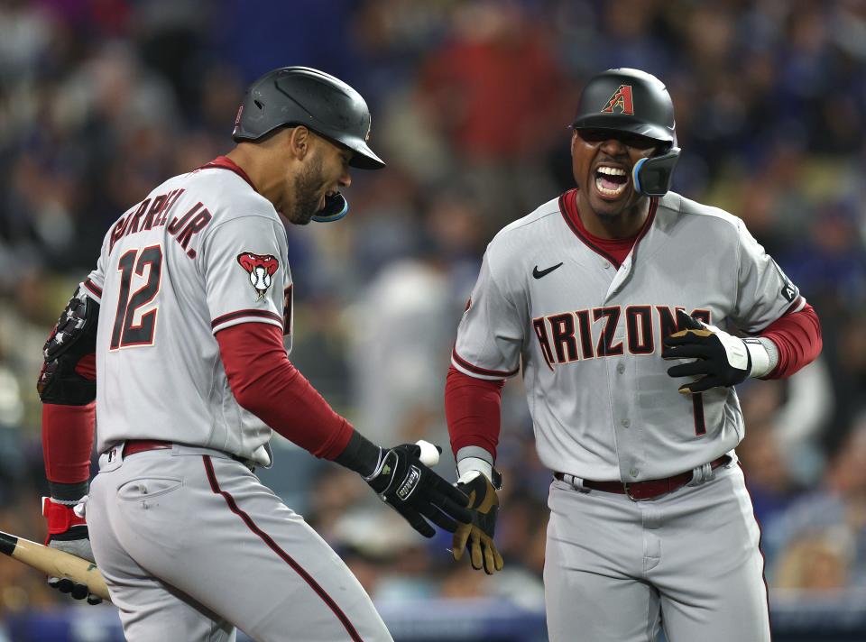 Kyle Lewis #1 of the Arizona Diamondbacks celebrates his two run homerun, to take a 2-1 lead over the Los Angeles Dodgers, during the eighth inning at Dodger Stadium on March 31, 2023 in Los Angeles, California.