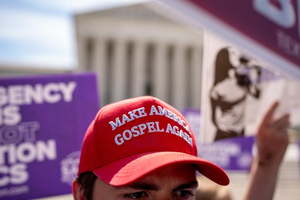 WASHINGTON, DC - JUNE 20: A man wears a hat that reads "Make America Gospel Again" as he joins a group of pro-life supporters in front of the Supreme Court on June 20, 2024 in Washington, DC. The Supreme Court issued four rulings today including upholding a tax on foreign income, but has not yet announced rulings on a variety of high profile cases dealing with abortion rights, gun rights, and former President Donald Trump's immunity claim. (Photo by Andrew Harnik/Getty Images)