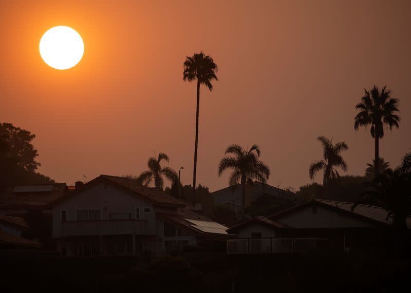 Fog and smoke in the air as sun rises in California