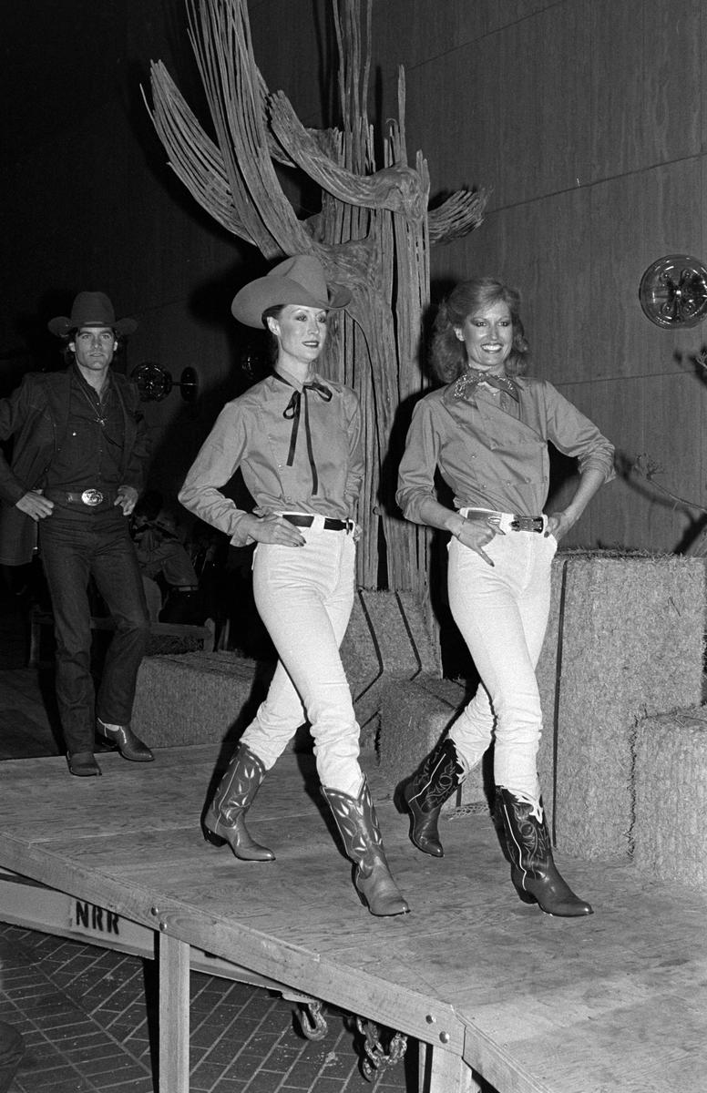 Models display clothes during an event at the Beverly Hills, California, Neiman Marcus store on May 7, 1979.