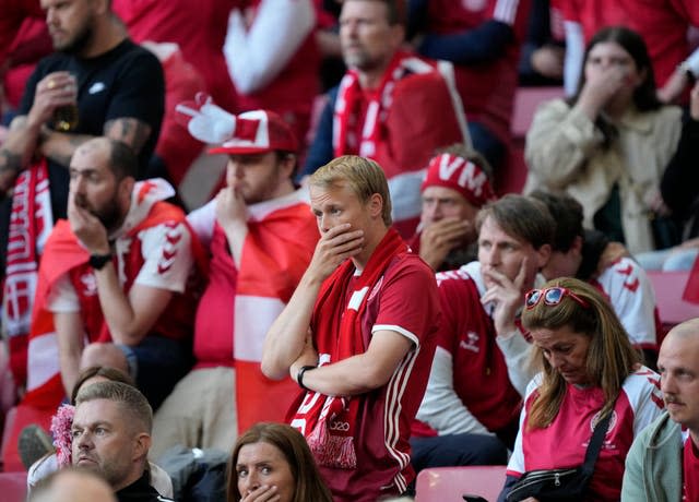 Denmark fans react as Christian Eriksen receives medical attention after collapsing in Copenhagen  