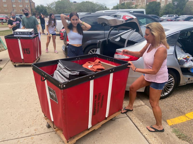 Kaitlyn Abercia is seen moving into her student residence at Gates Hall on the campus of Texas Tech University in Lubbock