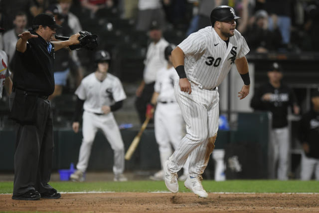 Jake Burger of the Chicago White Sox celebrates a home run against