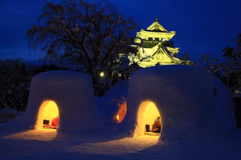 snow huts and a castle in Japan