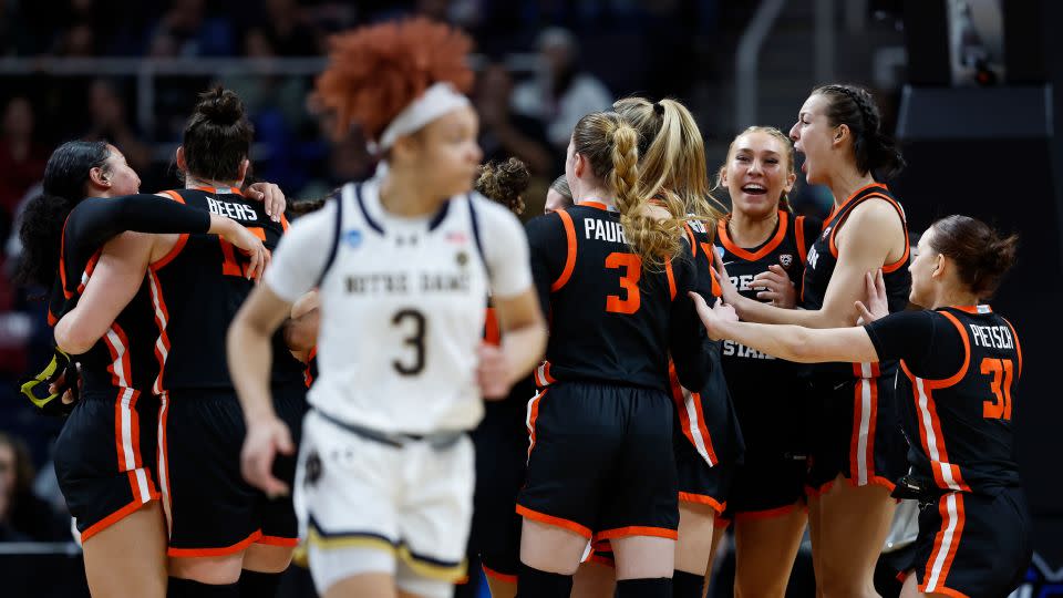 The Oregon State Beavers celebrate after defeating the Notre Dame Fighting Irish. - Sarah Stier/Getty Images