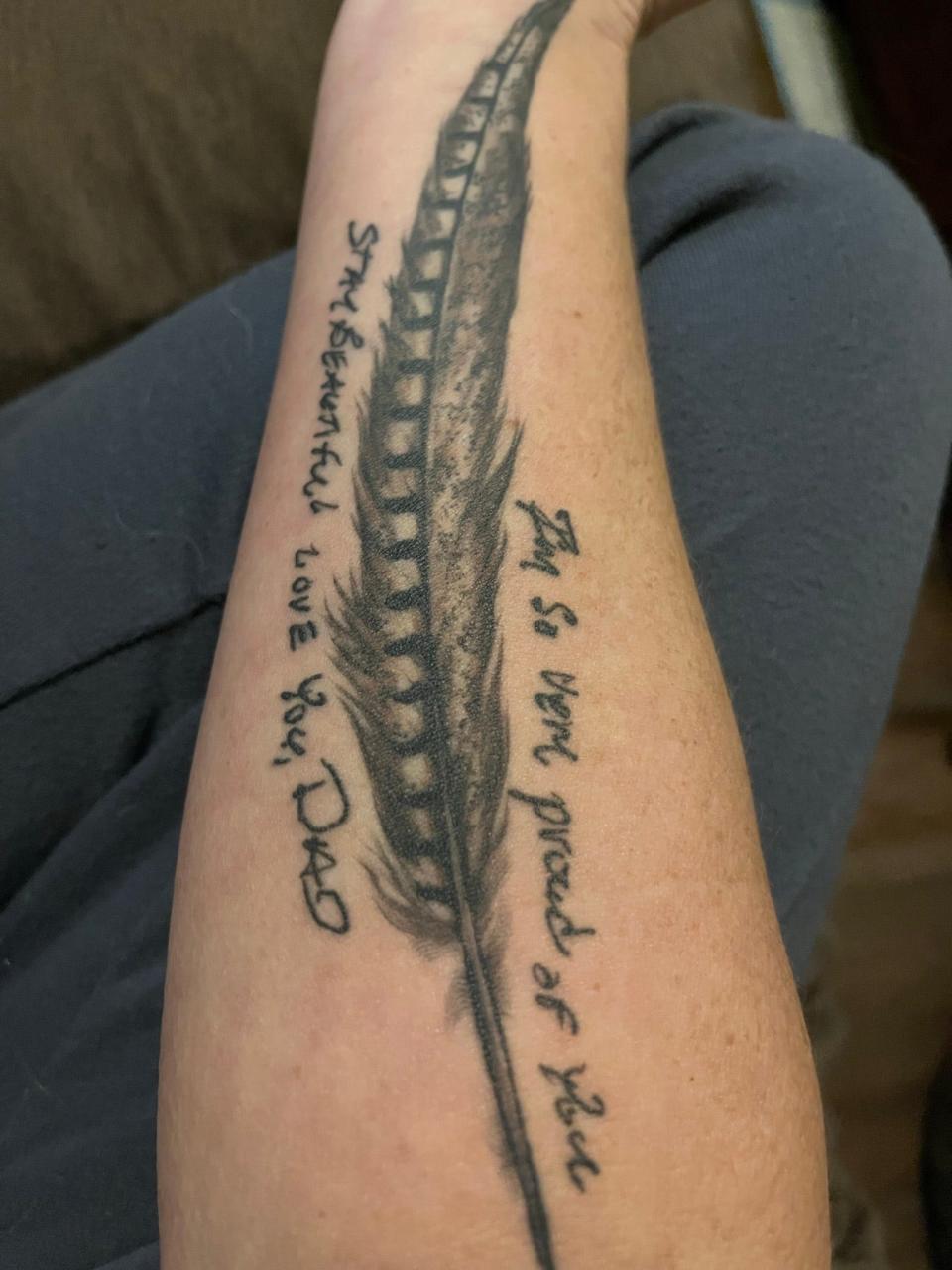 Kelly Brotz's tattoo commemorates her father with a pheasant feather and message.