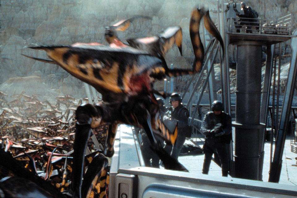 A still from the 1997 film "Starship Troopers," which centers on a 23rd-century war between humanity and a race of insect-like aliens. <cite>Everett Collection</cite>