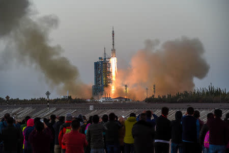 Shenzhou-11 manned spacecraft carrying astronauts Jing Haipeng and Chen Dong blasts off from the launchpad in Jiuquan, China, October 17, 2016. REUTERS/Stringer