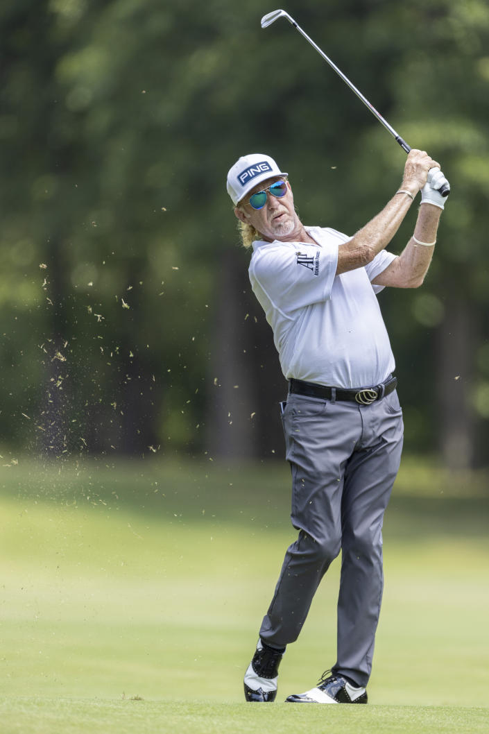 Miguel Angel Jimenez hits a fairway shot on one during the final day at the Regions Tradition, a PGA Tour Champions golf event, Sunday, May 15, 2022, in Birmingham, Ala. (AP Photo/Vasha Hunt)