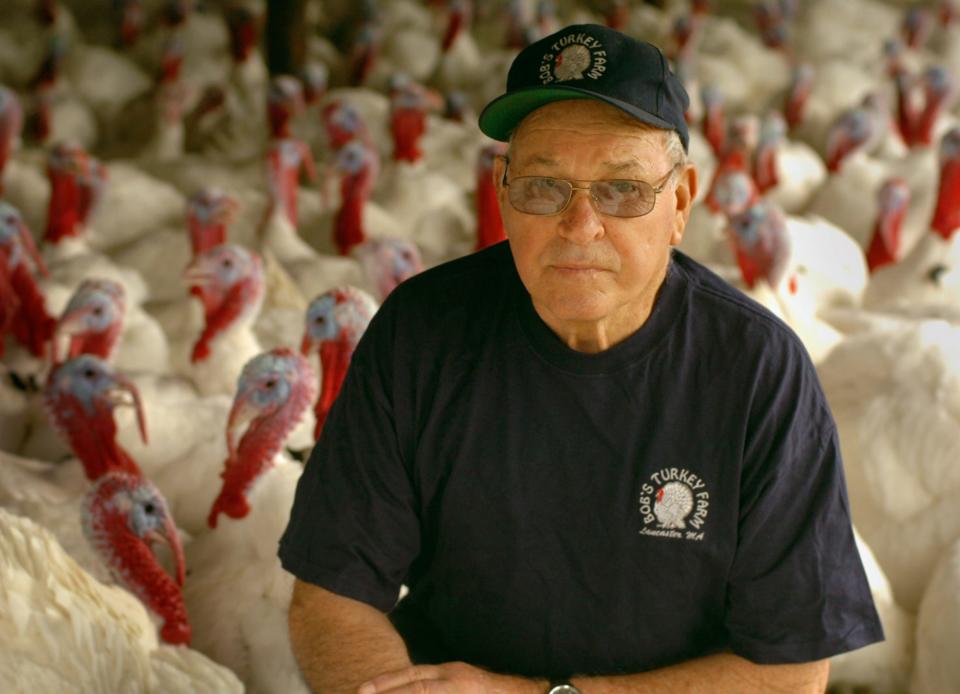 Robert Van Hoof sits among 500 turkeys at Bob's Turkey Farm in Lancaster in November 2006. He started the farm nearly seven decades ago.