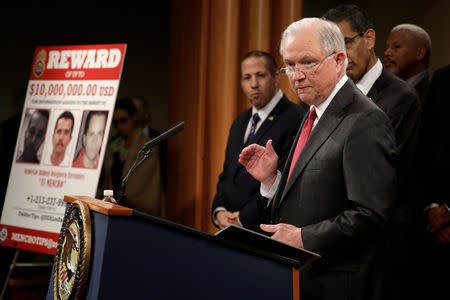 FILE PHOTO: U.S. Attorney General Jeff Sessions speaks at a news conference with other law enforcement officials to announce enforcement efforts against Cartel Jalisco Nueva Generacion (CJNG) at the Justice Department in Washington, U.S., October 16, 2018. REUTERS/Yuri Gripas
