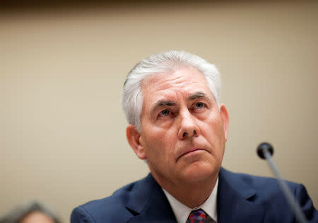 Rex Tillerson, chairman and CEO of ExxonMobil, testifies about the company's acquisition of XTO Energy before the House Energy and Environment Subcommittee on Capitol Hill in Washington January 20, 2010. REUTERS/Joshua Roberts/File Photo