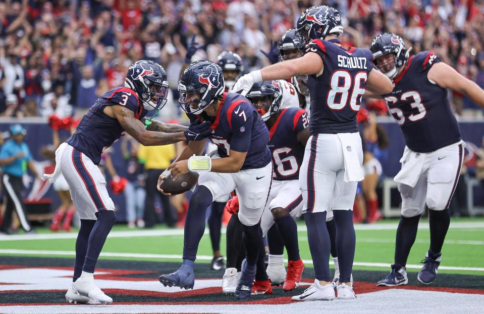 Texans quarterback C.J. Stroud celebrates after scoring a two-point conversion during the fourth quarter against the Buccaneers at NRG Stadium in Houston on Nov. 5, 2023.