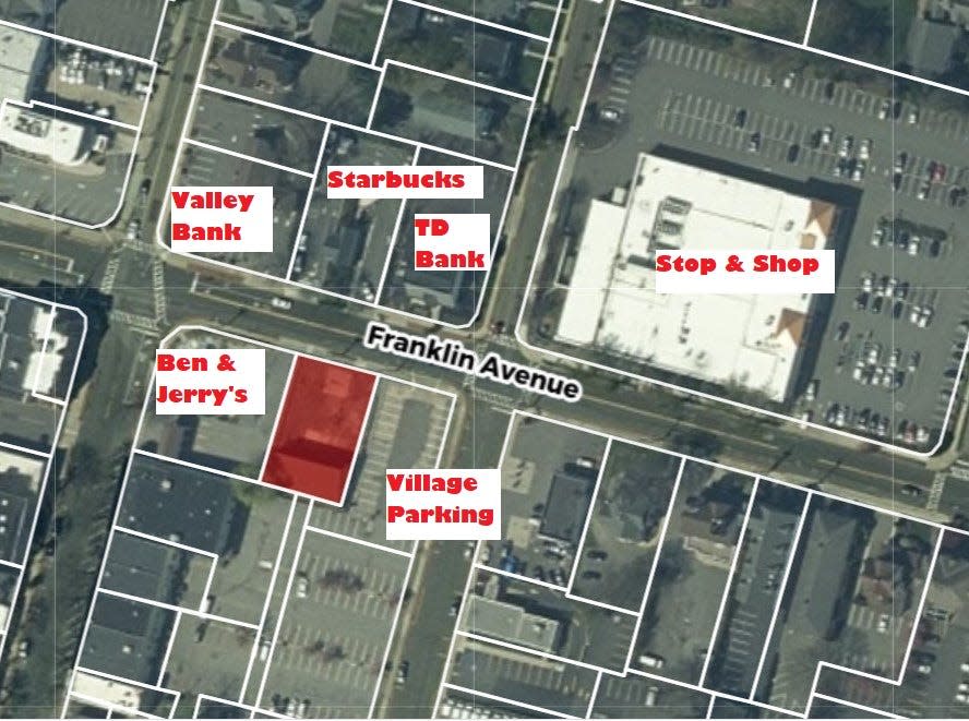 Ridgewood's Town Garage property (red) at 120 Franklin Ave. is sandwiched between Ben & Jerry's and a Village parking lot .