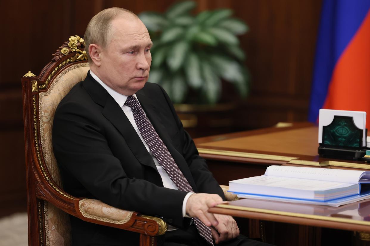 Russian President Vladimir Putin listens to Russian Human Rights ombudsman Tatyana Moskalkova during their meeting at the Kremlin in Moscow, Russia, Monday, June 6, 2022. (Mikhail Metzel, Sputnik, Kremlin Pool Photo via AP)