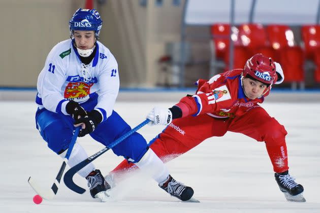 Finnish and Russian hockey players compete in the 2018 Bandy World Championship semi-final match in Khabarovsk, Russia. (Photo: Yuri Smityuk via Getty Images)