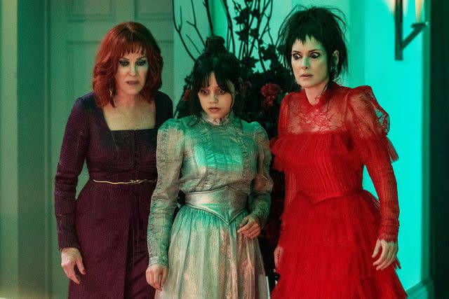 <p>Warner Bros. Pictures</p> Delia (Catherine O'Hara), Astrid (Jenna Ortega), and Lydia Deetz (Winona Ryder) in 'Beetlejuice Beetlejuice'