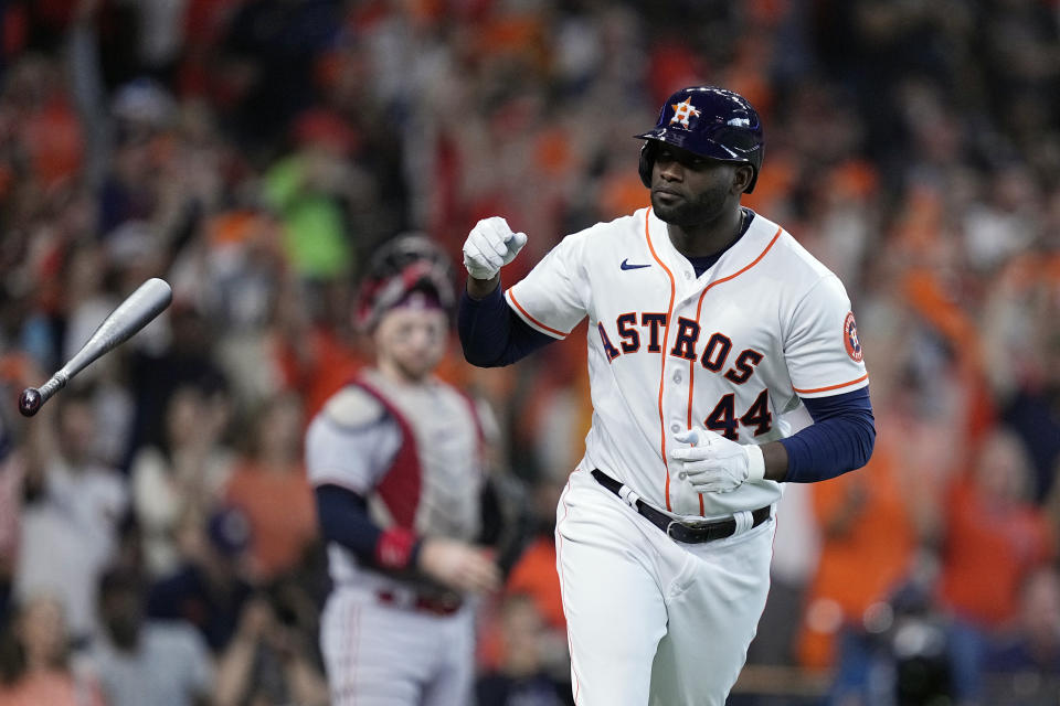 Houston Astros designated hitter Yordan Alvarez flips his bat after his two-run home run during the third inning in Game 1 of an American League Division Series baseball game against the Minnesota Twins, Saturday, Oct. 7, 2023, in Houston. (AP Photo/Kevin M. Cox)