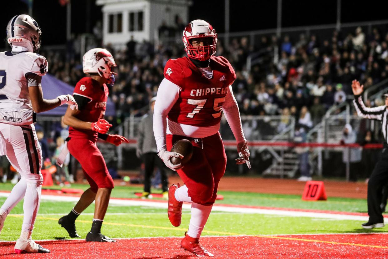 Clinton Township Chippewa Valley offensive lineman Davont'a Love runs for a touchdown against Macomb Dakota during the first half of a MHSAA Division 1 district final at Chippewa Valley High School in Clinton Township on Friday, Nov. 3, 2023