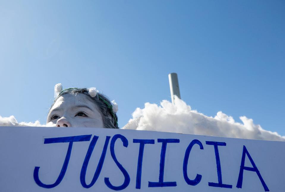 Members of Colectivo Angeles Mensajeros hold a memorial for 40 migrants who died at this Mexican migrant detention center on the anniversary of the fire on March 27, 2024.