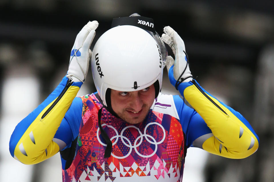 Andriy Mandziy may have fell off his luge on Saturday, but he hopped back on and finished the race. (Getty)