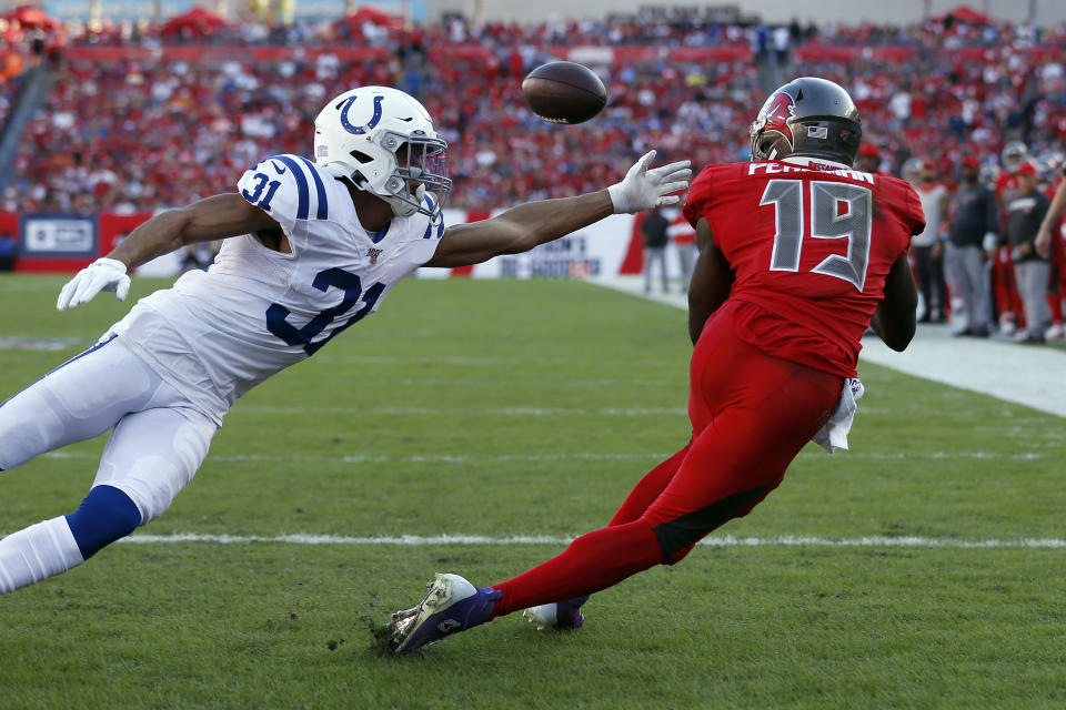 Tampa Bay Buccaneers wide receiver Breshad Perriman (19) beats Indianapolis Colts cornerback Quincy Wilson (31) on a 12-yard touchdown pass during the second half of an NFL football game Sunday, Dec. 8, 2019, in Tampa, Fla. (AP Photo/Mark LoMoglio)