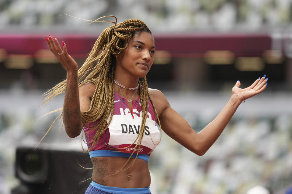 Tara Davis-Woodhall, seen here at the 2020 Olympics in Tokyo, was stripped of a national title for a positive THC test. (AP Photo/Matthias Schrader, File)