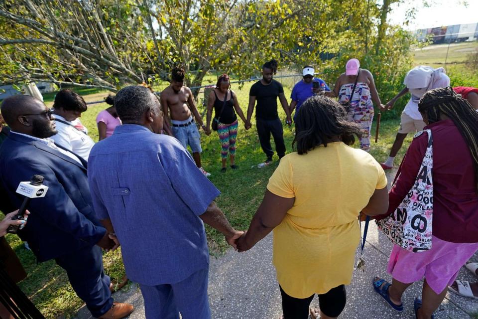 PHOTO: Residents gather for a prayer near the scene of a mass shooting Saturday, Aug. 26, 2023, in Jacksonville, Fla. (AP Photo/John Raoux) (John Raoux/AP)