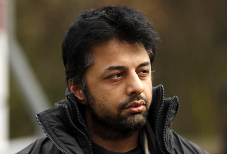 FILE - In this Thursday, Feb. 24, 2011 file photo, Shrien Dewani, the British man accused of having his wife murdered during their honeymoon in South Africa, arrives at Belmarsh Magistrates' Court in London. Murder suspect Shrien Dewani has lost his bid to block his extradition to South Africa, where he's accused of arranging the murder of his new wife, Anni, during a honeymoon trip in 2010. The case has drawn attention in both countries, and has been dragged out by legal wrangling in Britain over whether Dewani is fit to be removed from the country. Dewani denies the charges, and his lawyers argue that he suffers post-traumatic stress and depression and should not be extradited. Britain's High Court on Friday, Jan. 31, 2014, approved Dewani's removal so long as South African authorities could give a guarantee as to how long he would be kept there without trial. The court had been told the South Africans were willing to do so. (AP Photo/Matt Dunham, File)