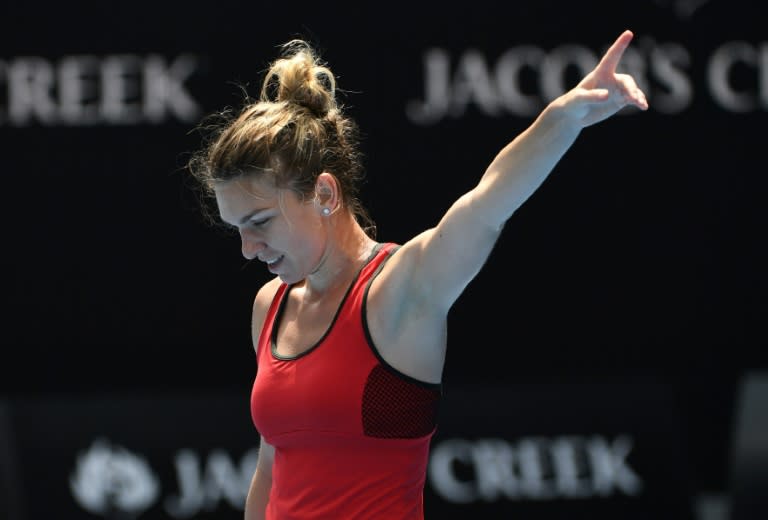 Romania's Simona Halep says "I'm almost dead," after saving three match points to survive a titanic struggle against Lauren Davis of the US in their third round matchat the Australian Open