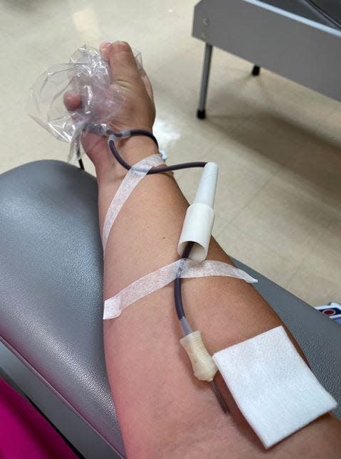 Reporter Lindsey Leake donates blood in Stuart, Fla., on July 15, 2021.