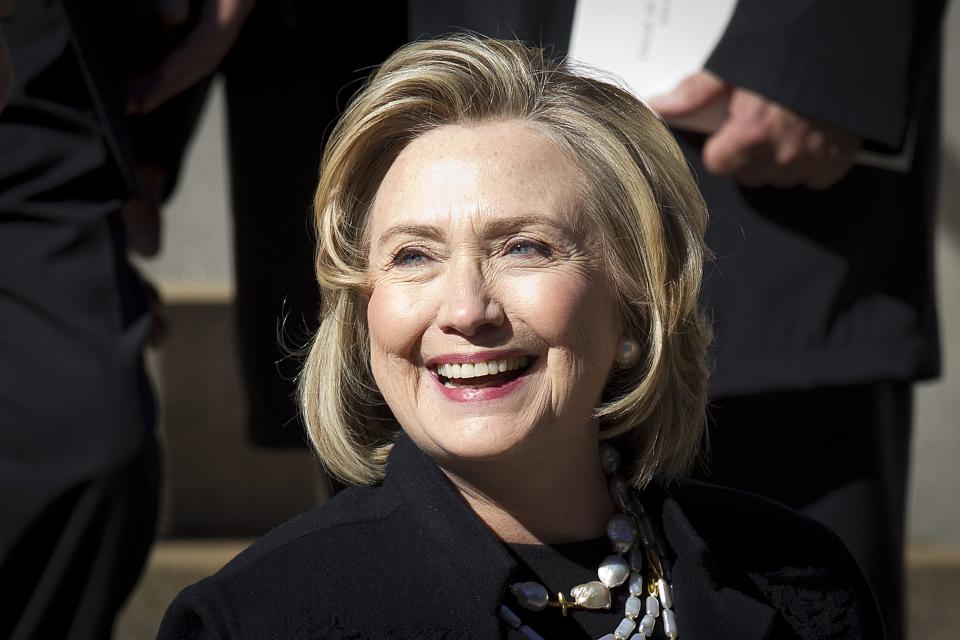 Former first lady Hillary Clinton departs St. Ignatius Loyola church following fashion designer Oscar de la Renta's memorial service in the Manhattan borough of New York November 3, 2014. REUTERS/Carlo Allegri (UNITED STATES - Tags: ENTERTAINMENT HEADSHOT POLITICS OBITUARY)