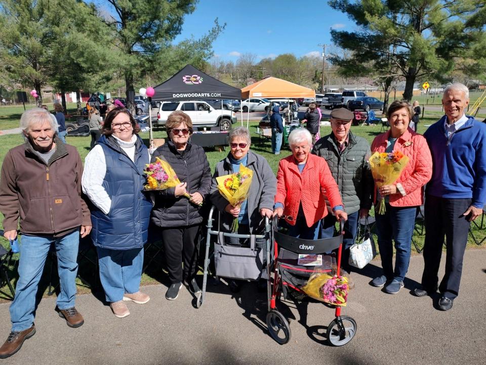 A dedication of some newly planted dogwood trees in honor of longtime West Hills Community Association volunteers was held on April 6, 2024, at West Hills Park. From left are Mike Patton, Micki Puleo, and Susan Williams (the children of late honorees Betty and Charles Patton), and honorees Erika Fuhr, Barbara and Reuben Pelot, and Jane and Chuck Anderton.