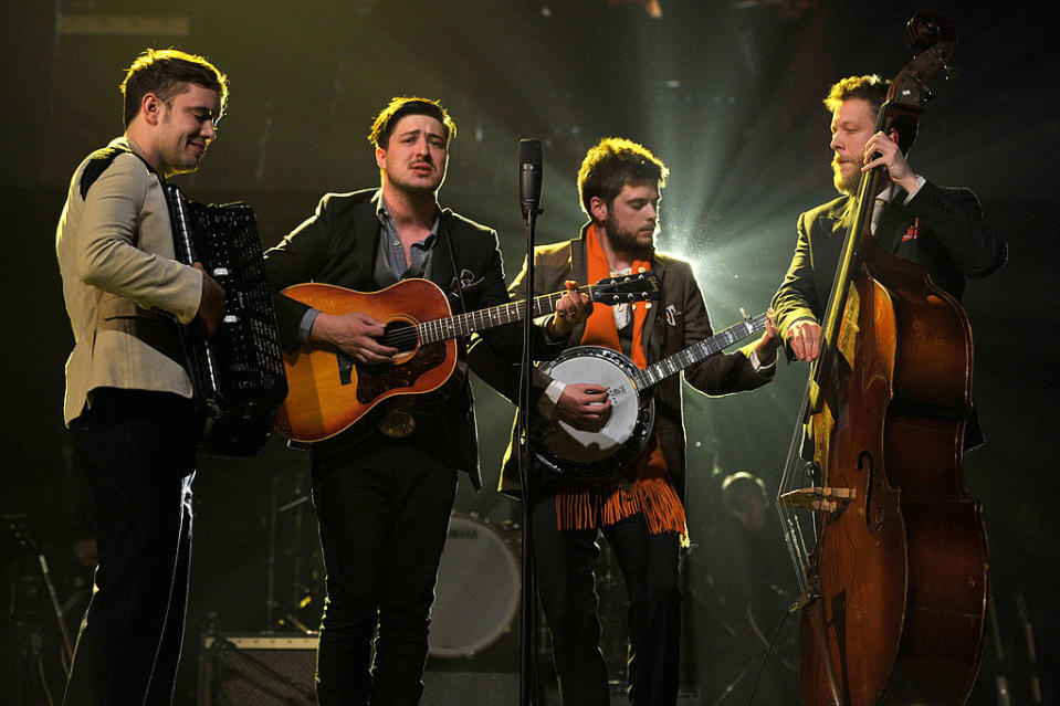 the band playing on stage