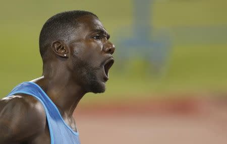Justin Gatlin from the U.S. reacts after winning the men's 100 meters event during the Diamond League meeting in Doha, Qatar in this file photo taken on May 15, 2015. REUTERS/AK Bijuraj