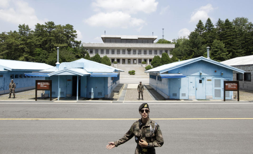 In this June 12, 2019, photo, a South Korean soldier gestures during a press tour at the Panmunjom in the Demilitarized Zone (DMZ), South Korea. U.S. President Donald Trump on Saturday, June 29, 2019 invited North Korean leader Kim Jong Un to shake hands during a visit by Trump to the DMZ with South Korea. (AP Photo/Lee Jin-man)