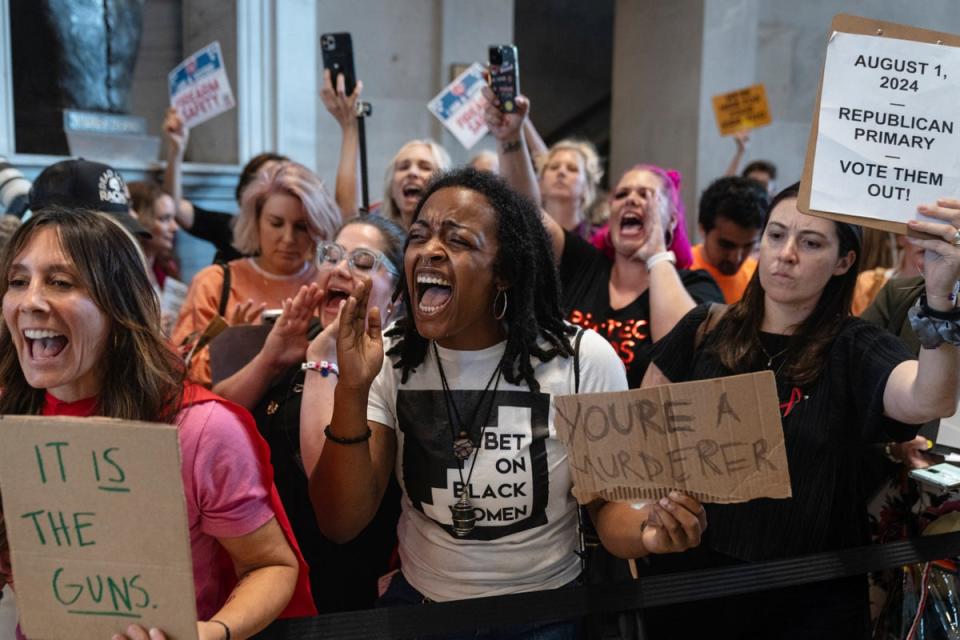 People protest outside the Tennessee House chamber after Democratic Tennessee state Rep Justin Jones was silenced by Republican lawmakers during a special session on gun violence on 28 August, 2023. (REUTERS)