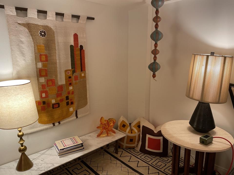 Side angle of the hotel room, showing the art