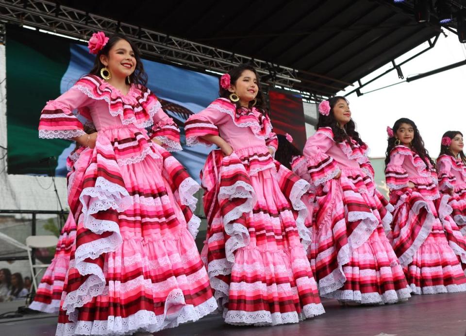 Cielo de México dancers perform in flowing pink dresses at Pasco’s Cinco de Mayo on Saturday, May 4.