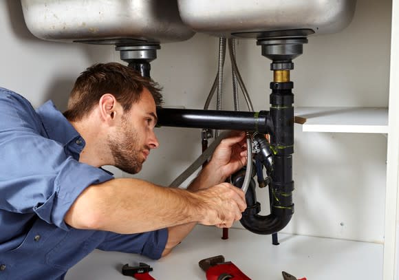 Man working on pipes