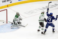 Dallas Stars goalie Anton Khudobin (35) is scored against as Tampa Bay Lightning's Anthony Cirelli (71) reacts and Stars' Roope Hintz (24) defends during first-period NHL Stanley Cup finals hockey action in Edmonton, Alberta, Monday, Sept. 21, 2020. (Jason Franson/The Canadian Press via AP)