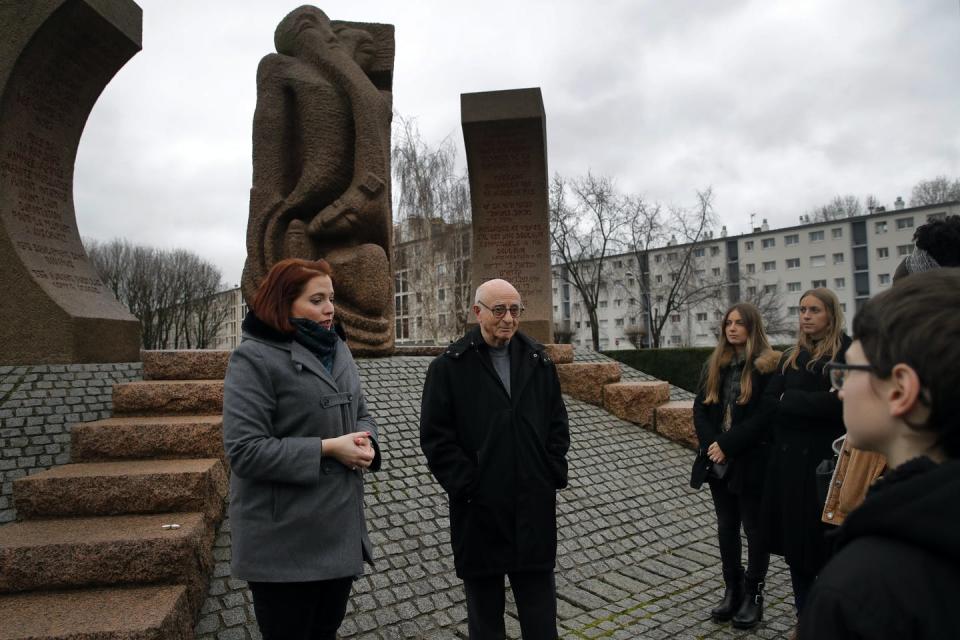 A man speaks to a group