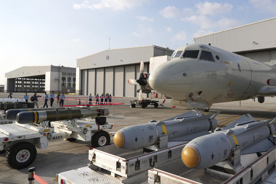 Missiles are displayed near a AGM-65 Maverick air to ground missile near the P-3 submarine hunter aircraft at an airbase in southern Taiwan's Pingtung county on Tuesday, Jan. 30, 2024. Taiwan is holding spring military drills following its recent presidential election and amid threats from China, which claims the island as its own territory that it is determined to annex, possibly by force.(AP Photo/Johnson Lai)