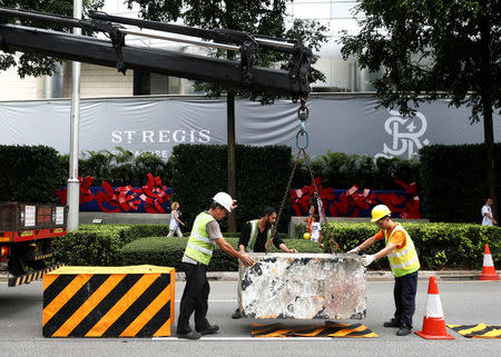 Roadblocks are set up outside St Regis Hotel in Singapore June 9, 2018. REUTERS/Edgar Su