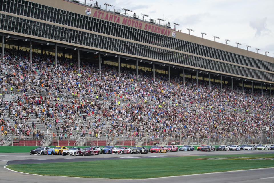 Drivers start a NASCAR Cup Series auto race at Atlanta Motor Speedway on Sunday, July 9, 2023, in Hampton, Ga. (AP Photo/Brynn Anderson)