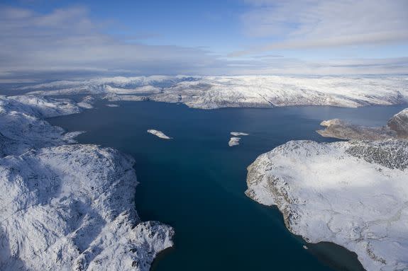 Chunks of ice are breaking off the Sermeq Kujalleq glacier in Greenland at a rising clip because of global warming.