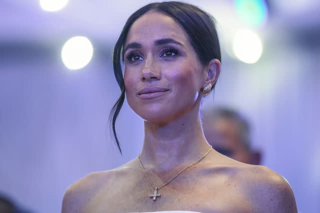<p>KOLA SULAIMON/AFP via Getty</p> Meghan Markle attends a reception at the Nigerian Defence Headquarters in Abuja on May 11, 2024