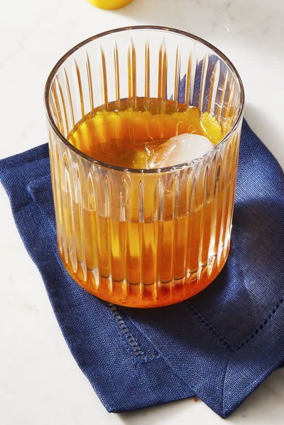 apple cider cocktail with orange rind