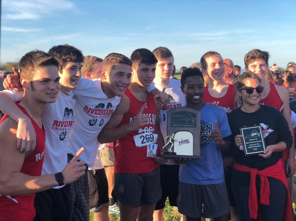 Photograph taken in 2018 of Staunton artist Noelia Nuñez when she received "Coach of the Region" for the boys cross country team at Riverheads High School when the team won the region championship.